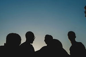 silhouette of a group of people