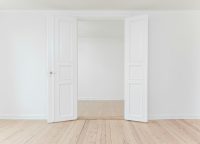 two open white doors